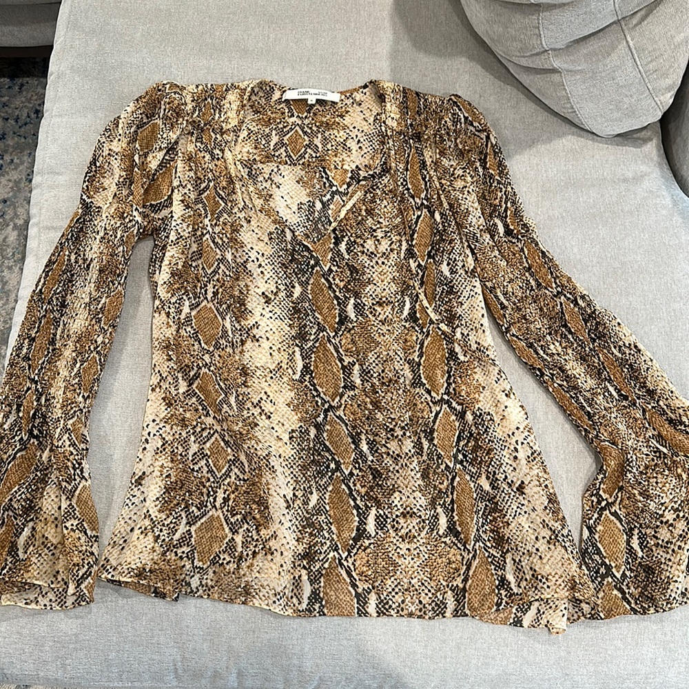 Diane Von Furstenberg silk animal print blouse.